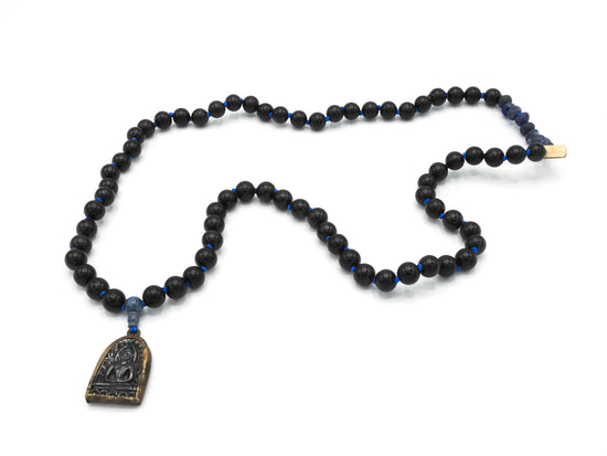 Blue Buddha Necklace by Jen Stock, as seen on Chris Lee