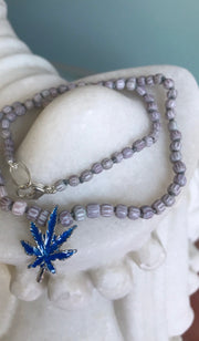 short leaf, purple beads